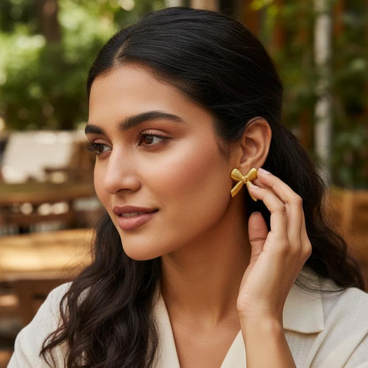 Gold Ribbed Bow Stud Earrings – Stainless Steel