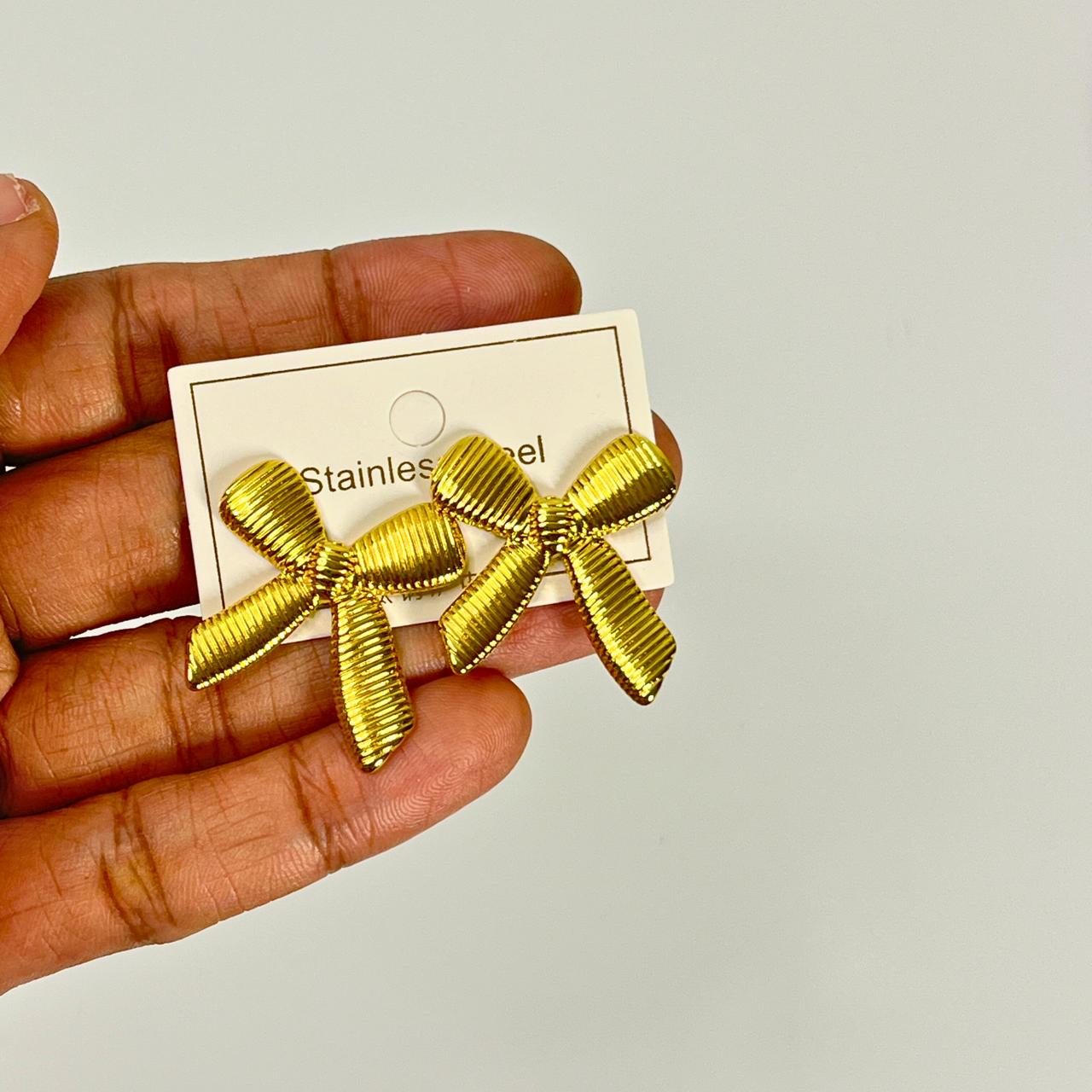 Gold Ribbed Bow Stud Earrings – Stainless Steel